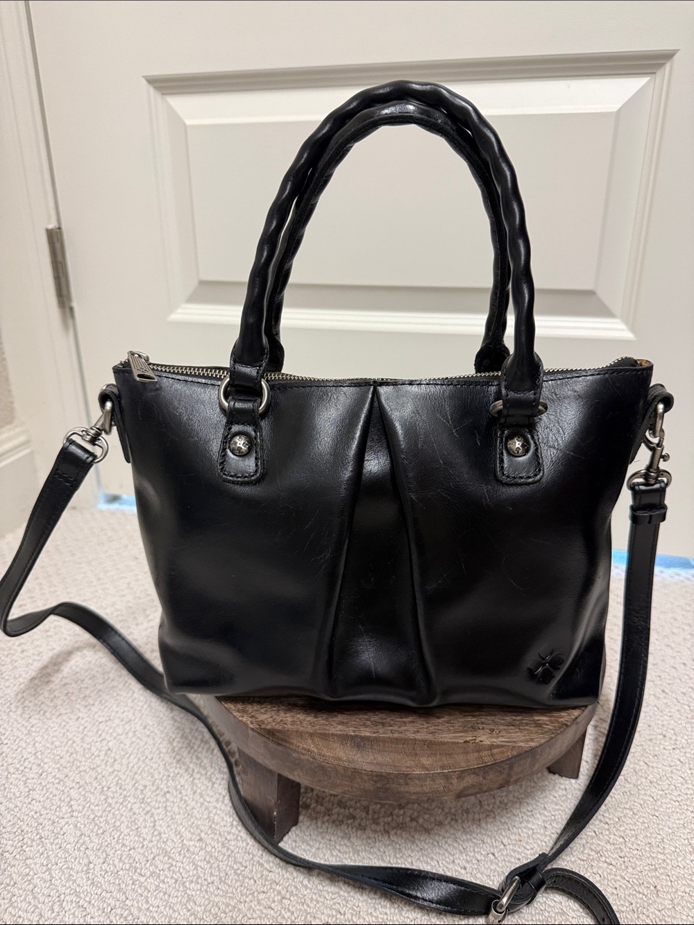 From  Patricia Nash, this Zora Top Handle Crossbody Bag